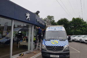 Allder Glass mending panelled Honda showroom glass