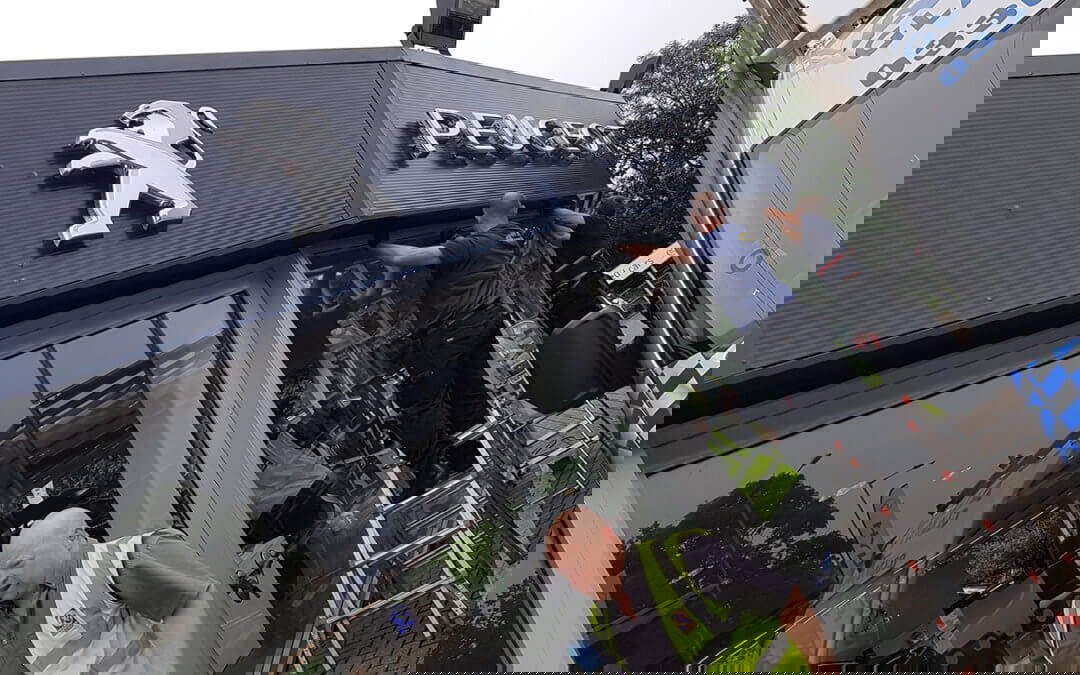 Window replacement in Car Showroom