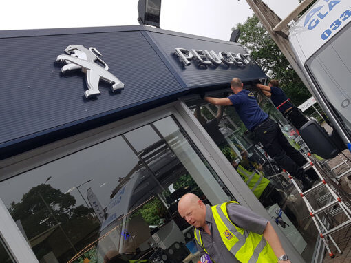 Window replacement in Car Showroom